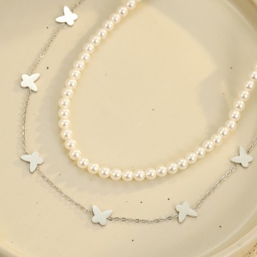 Collier Anna argenté double rang avec perles et papillons posé à plat