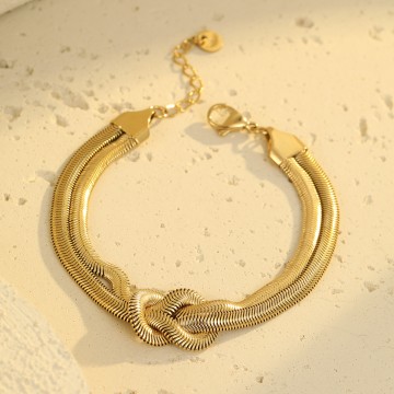Bracelet Elly doré en maille serpent plate avec nœud central